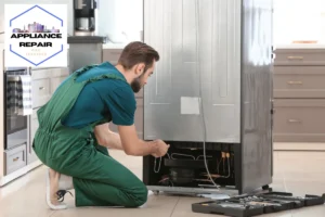 male tech repairing refrigerator