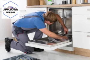repairman fixing dishwasher