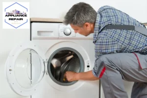 Repairman Checking Washing Machine At Home