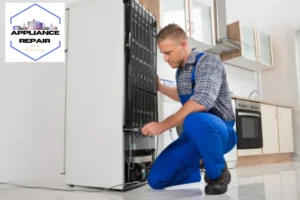 repairman repairing appliance in the kitchen